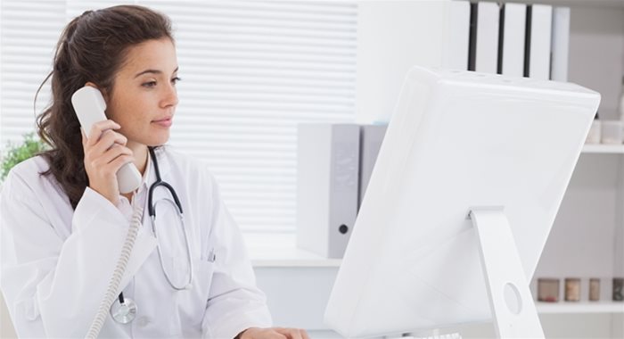 Ortholese team member taking a call